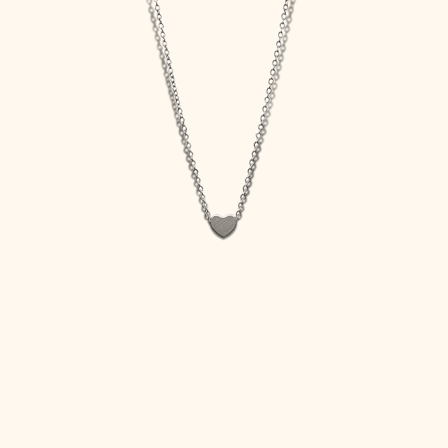 Minimalistiskt halsband med hjärthänge