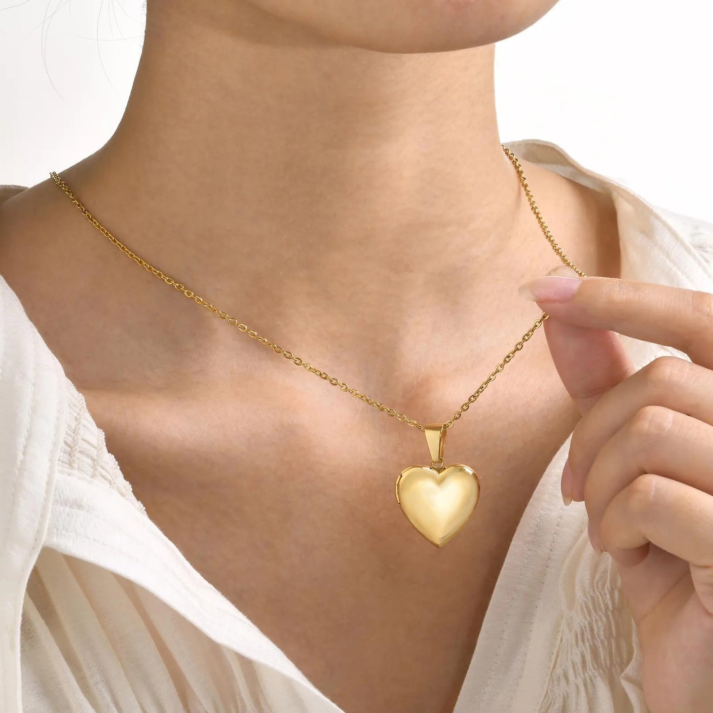 <tc>Heart Shaped Photo Locket</tc>