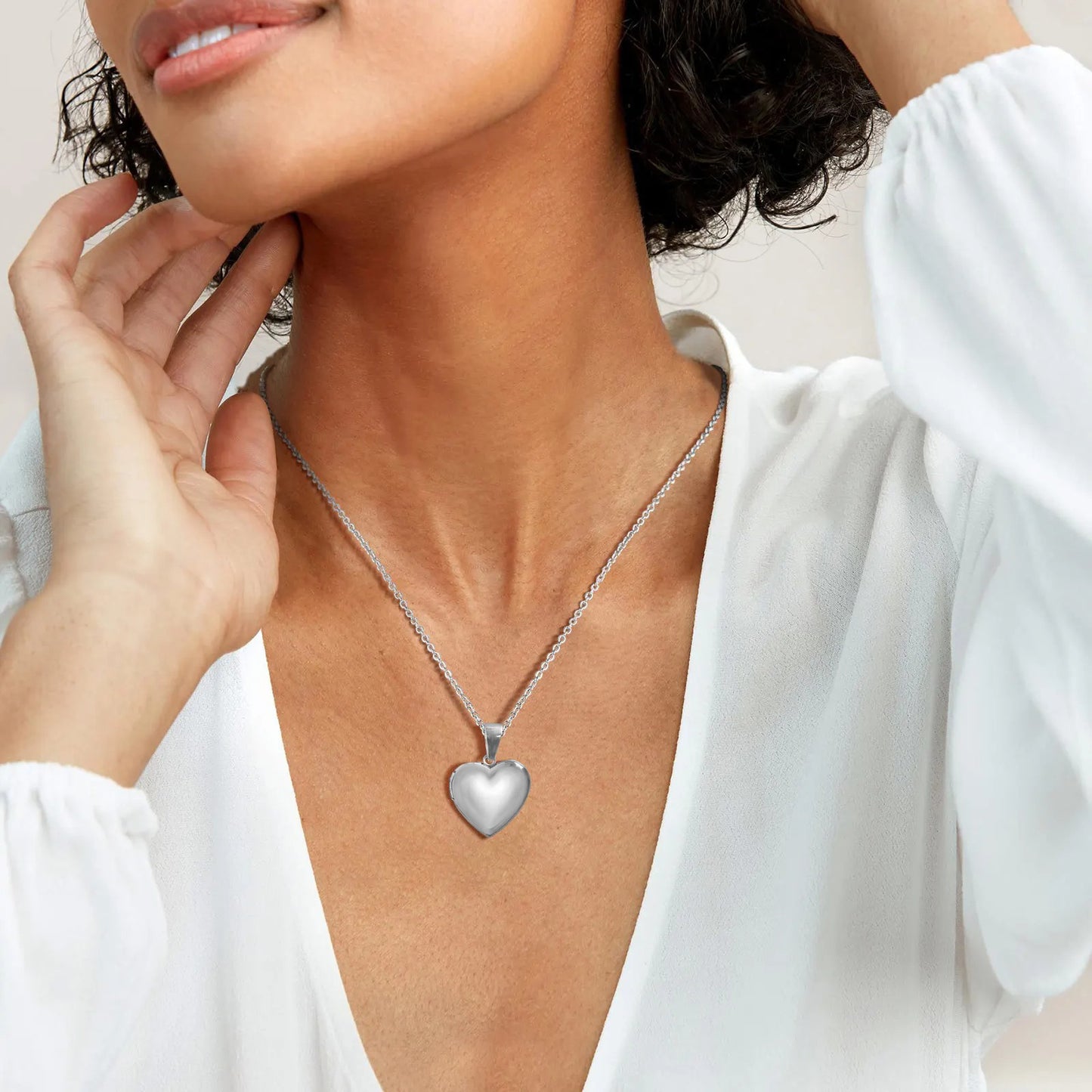 <tc>Heart Shaped Photo Locket</tc>