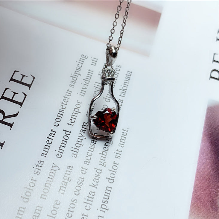Bottle post the birthplace necklace